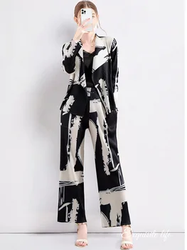 Ženski temperamentna odijelo OL 2023, осеннее elegantan moderan slobodno kaput s dugim rukavima i отворотами i širokim hlačama s visokim strukom, komplet od dva predmeta